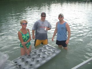 Kurt & his wife Marcia with Dave in the Lake